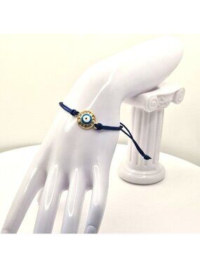 Evil Eye Adjustable Bracelet With Blue Cord & Gold Crystal Charm